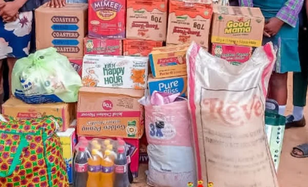 Cartons of food, drinks, bags of rice and household supplies gathered for an orphanage outreach
